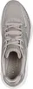 A top-down view of a beige Skechers sneaker with silver glitter accents. Voir les images du produit