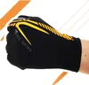 A hand wearing a black glove with yellow accents. Podgląd zdjęcia produktu