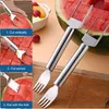 A collage of images showing how to use a watermelon slicer, with a close-up of the product and a bowl of fruit in the background. Produktbild-Vorschau