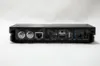 The back panel of a black satellite receiver is shown against a white background. Produktbild-Vorschau