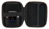 A black protective case is open, showing a black digital audio recorder inside. The case has an orange trim. Náhled obrázku produktu