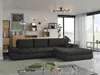A modern living room with a sectional sofa, coffee table, and large windows. Náhľad obrázku produktu