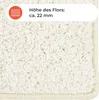 A close-up of a cream-colored shaggy rug with a text overlay indicating the pile height. Náhled obrázku produktu