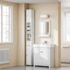 A clean and modern bathroom with a white tall cabinet and a white vanity with a sink and faucet. Náhled obrázku produktu