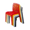 A stack of colorful plastic chairs. Produktbild-Vorschau