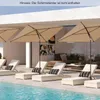 A row of lounge chairs and umbrellas by a pool, with a modern building in the background. Podgląd zdjęcia produktu