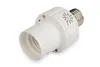 A white lamp adapter with a timer dial is shown against a white background. Produktbild-Vorschau