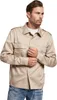A man wearing a beige shirt and blue jeans, posing against a white background. Anteprima dell’immagine prodotto