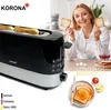 A woman is holding toast next to a toaster, with jam and butter on the side. Náhľad obrázku produktu
