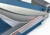 Close-up of a paper cutter with a laser guide. Voir les images du produit