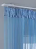 A close-up view of a blue string curtain hanging from a white curtain rod. Produktbild-Vorschau