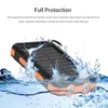 A solar power bank is shown partially submerged in water, with water splashing around it, highlighting its waterproof feature. Voir les images du produit
