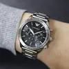 A close-up shot of an Emporio Armani watch on a person's wrist. Náhled obrázku produktu