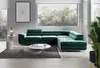 A modern living room with a large green sectional sofa, coffee table, and a large window overlooking trees. Náhľad obrázku produktu