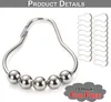 A close-up of a shower curtain hook with roller balls and a stack of additional hooks. Náhled obrázku produktu