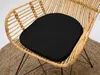 A black cushion on a rattan chair. Náhľad obrázku produktu