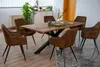 A dining table with chairs in a dining room setting. Produktbild-Vorschau