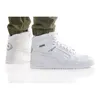 A person wearing white Puma high-top sneakers. Anteprima dell’immagine prodotto