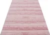 A close-up, angled view of a pink and white striped rug. Podgląd zdjęcia produktu