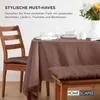 A dining table set with a brown tablecloth, placemats, bowls, and cutlery, with a wooden chair and bench with brown cushions. Anteprima dell’immagine prodotto