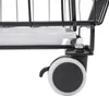 Close-up of the wheel and a bolt on a black storage rack. Voir les images du produit
