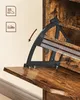 Close-up of a shoe cabinet mechanism with icons indicating boot and shoe storage. Produktbild-Vorschau