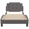 A bed frame with a grey upholstered headboard and wooden slats. Produktbild-Vorschau