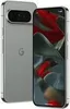 A silver Google Pixel 9 Pro XL smartphone is shown from the back and side, with its screen displaying a colorful abstract image. Náhľad obrázku produktu
