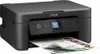 A black Epson XP-3200 printer is shown from a slightly elevated front-left angle, with a sheet of paper emerging from the output tray. Produktbild-Vorschau