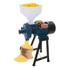 A corn grinder with a hopper full of corn, grinding corn into flour which is collected in a sack and a pile on the floor. Náhled obrázku produktu