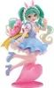A figurine of Hatsune Miku in a fairy tale outfit, standing on a pink heart-shaped base. Produktbild-Vorschau