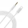 A white AUX to Lightning cable is coiled on a white background. Produktbild-Vorschau
