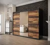 A bedroom or hallway setting with a large sliding door wardrobe. Produktbild-Vorschau