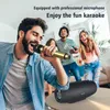 People enjoying karaoke at home with a speaker and microphone. Produktbild-Vorschau