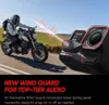 A person riding a motorcycle on a road, with a camera in the foreground and sound wave graphics. Anteprima dell’immagine prodotto