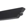 A close-up of the end of a black chair leg with a black rubber foot. Voir les images du produit