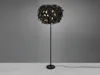 A black floor lamp with a feather-like shade is shown against a plain gray background. Voir les images du produit