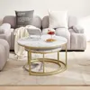 A living room scene with a sofa and coffee tables. Voir les images du produit