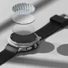 An exploded view of a smartwatch screen protector layers above a smartwatch. Produktbild-Vorschau