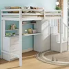 A white loft bed with a desk and closet, set up in a room with light blue walls and a wooden floor. Voir les images du produit