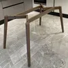 A wooden table base with four legs is shown on a marble-tiled floor, likely in a kitchen or dining area. Produktbild-Vorschau