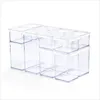 A set of clear plastic food storage containers with white lids, arranged in a grid on a white background. Produktbild-Vorschau