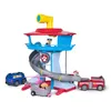 A Paw Patrol headquarters playset with vehicles and figures, displayed on a white background. Produktbild-Vorschau