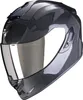 A black carbon fiber motorcycle helmet with a silver visor, shown from the front-left. Podgląd zdjęcia produktu