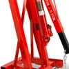 A close-up view of the hydraulic cylinder and frame of a red engine crane. Anteprima dell’immagine prodotto