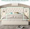 A tufted headboard bed with integrated bedside tables and lamps. Produktbild-Vorschau