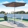 An outdoor bistro set with a table and two chairs under a large umbrella, placed on a wooden deck with artificial grass surrounding it. Produktbild-Vorschau
