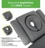Close-up of a massage table headrest with descriptive text and feature callouts. Produktbild-Vorschau