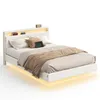 A white bed frame with LED lighting and a headboard shelf. Náhled obrázku produktu