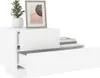 A white nightstand with two drawers, one of which is open, displaying a plant and a framed picture on top. Náhled obrázku produktu